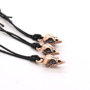 bronze mini sparrow skull necklace