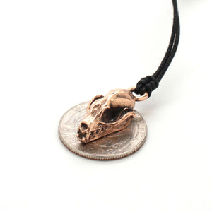 bronze mini bat skull necklace