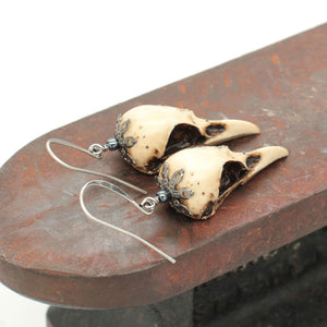 mini magpie earrings - aged bone